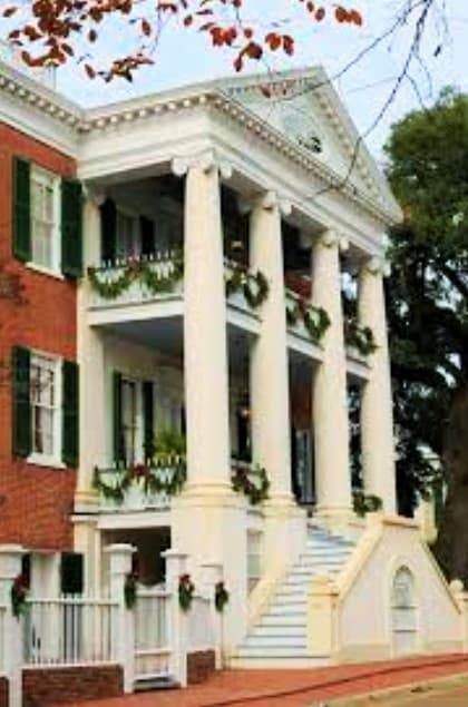 Historic Greek Revival columned house exterior in Natchez walking tour