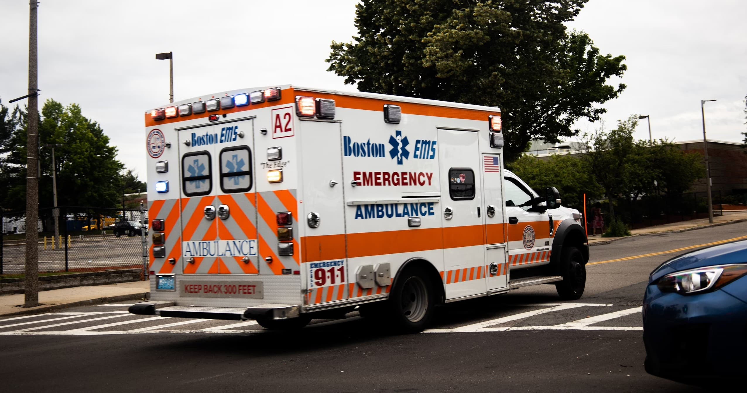 Emergency ambulance parked on city street responding to call