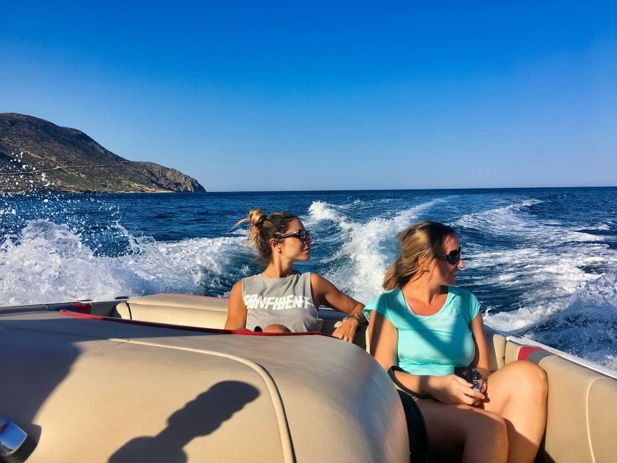 Two passengers enjoying high-speed boat tour on Aegean Sea