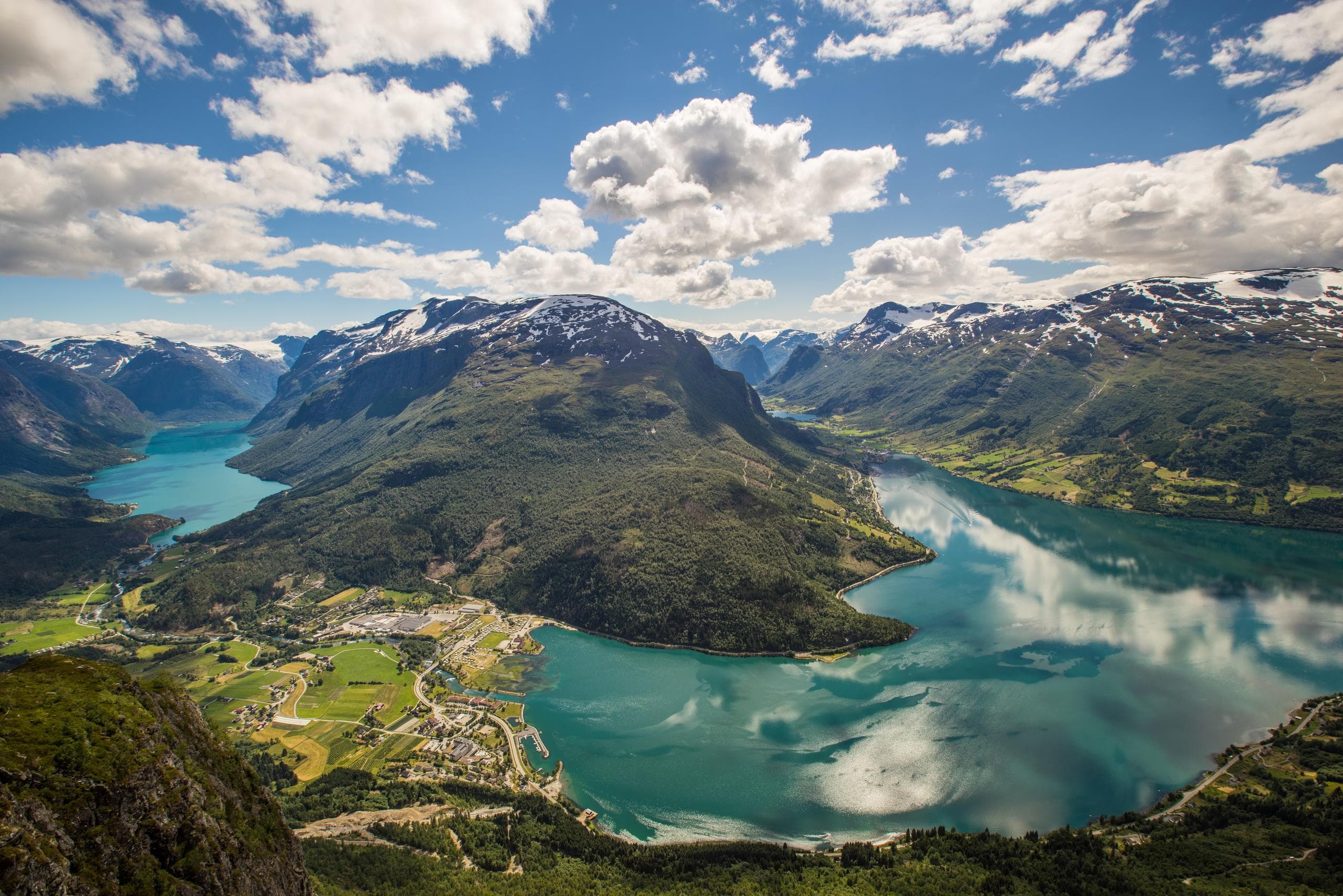 Aerial fjord panorama with turquoise lakes and mountain vistas