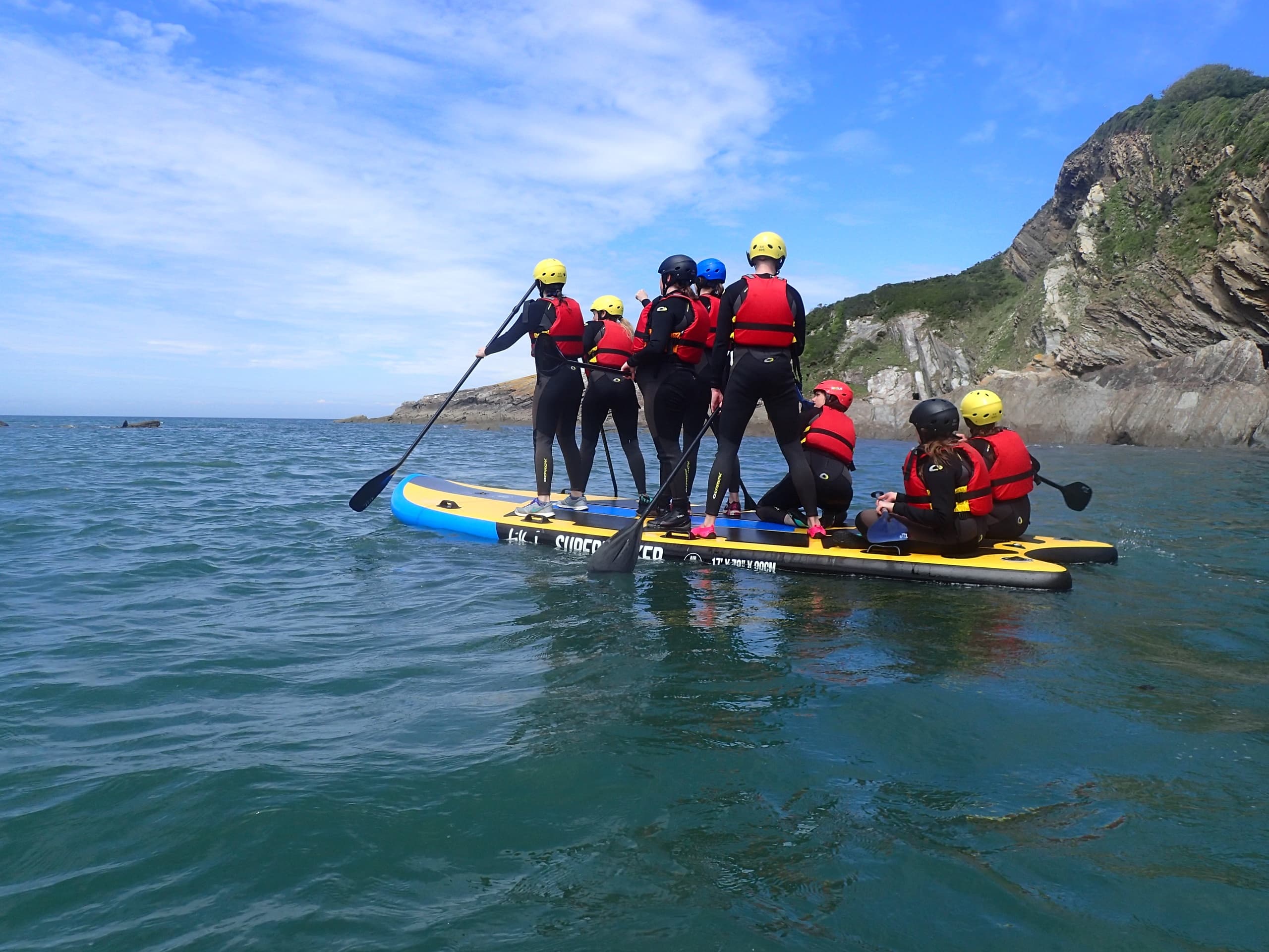Group Stand-Up Paddleboarding with OSKC Watersports in Combe Martin