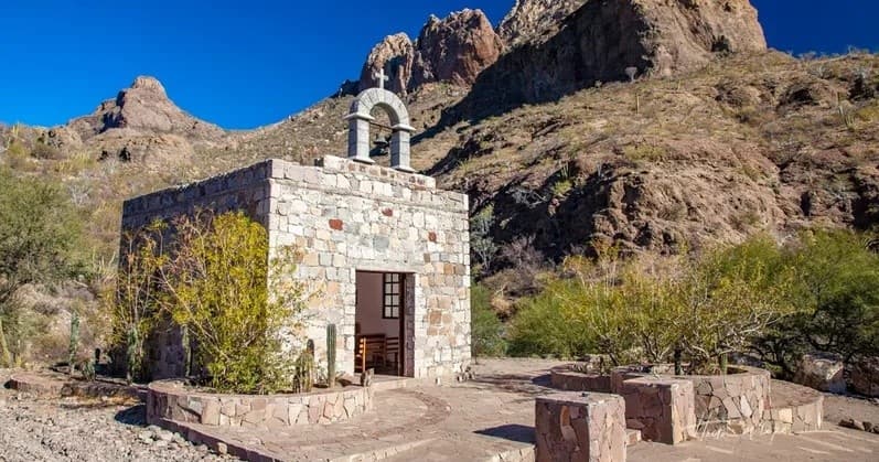 Historic desert chapel and mountain landscape in Baja California