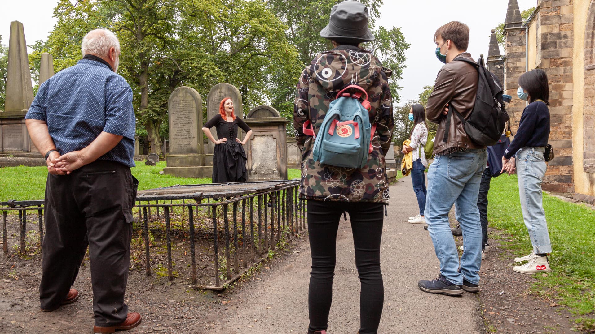 Small group cemetery walking tour at historic graveyard in Scotland