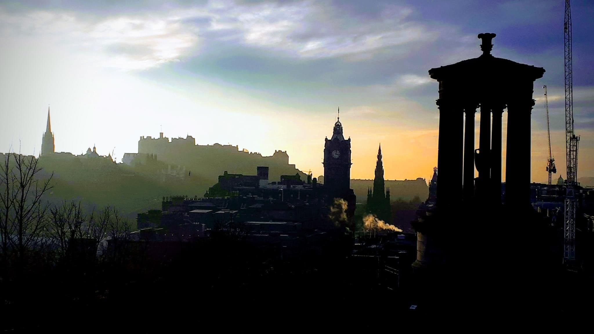 Sunrise view of Edinburgh skyline from Calton Hill