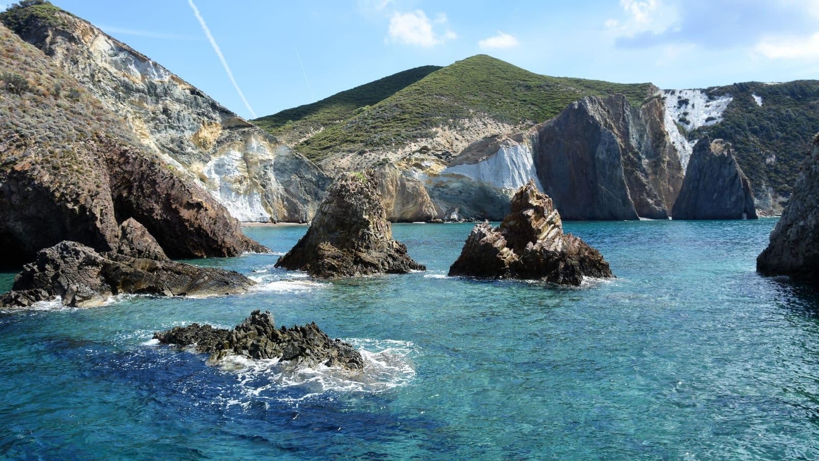 Aerial view of rocky bays and boats on Mediterranean coast