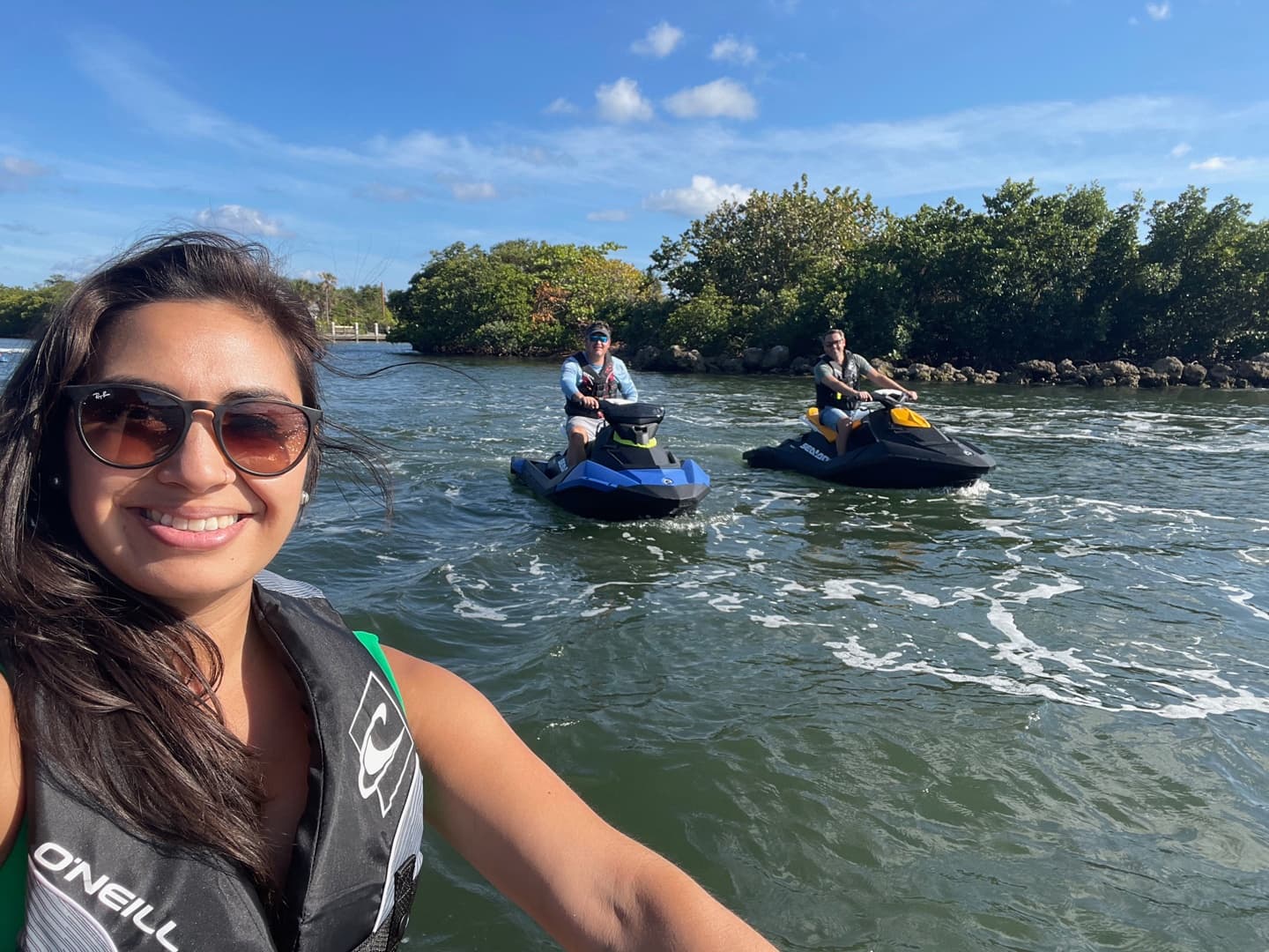 Woman selfie with jet skis near mangroves in Fort Lauderdale