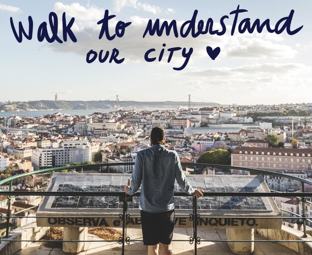 Traveler overlooking panoramic cityscape from hilltop viewpoint