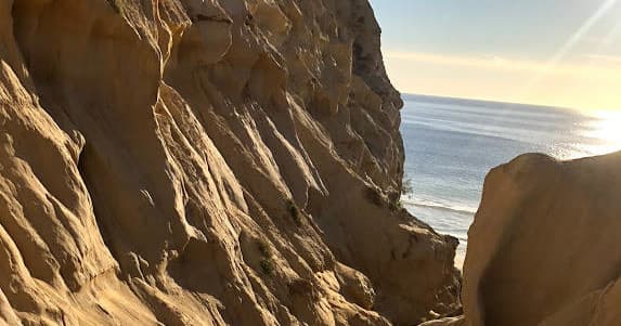 Scenic sandstone coastal cliffs at sunset in San Diego