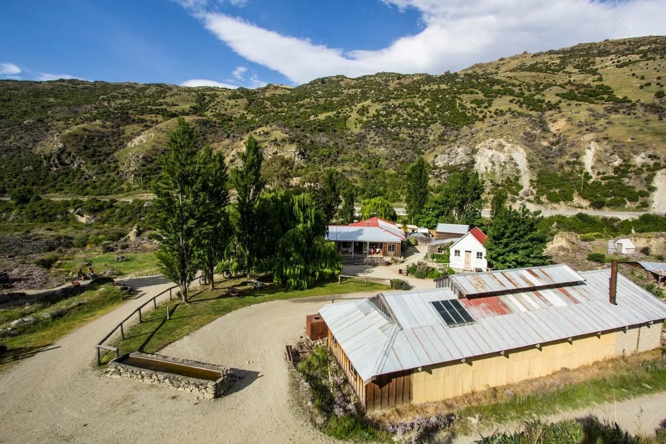 Aerial view of historic goldfields buildings in dry valley