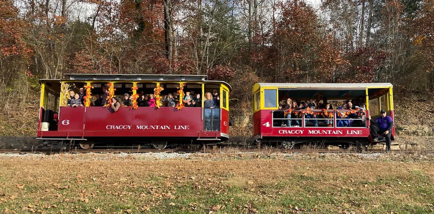 Open-Air Trolley to Silverline Park: Asheville's Scenic 7-Mile Round Trip