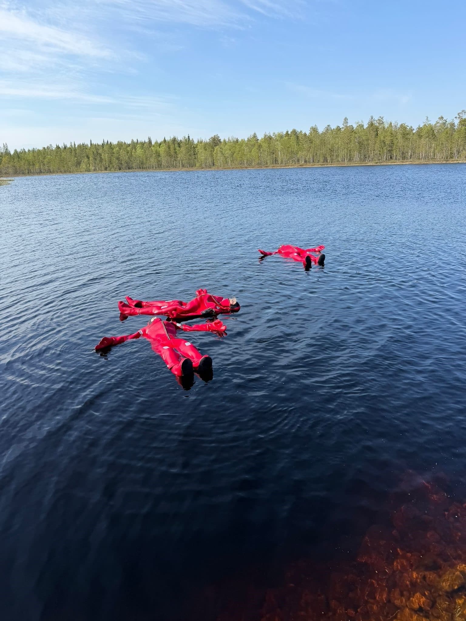 Float Under the Midnight Sun: Lake-Floating & Firelight near Rovaniemi