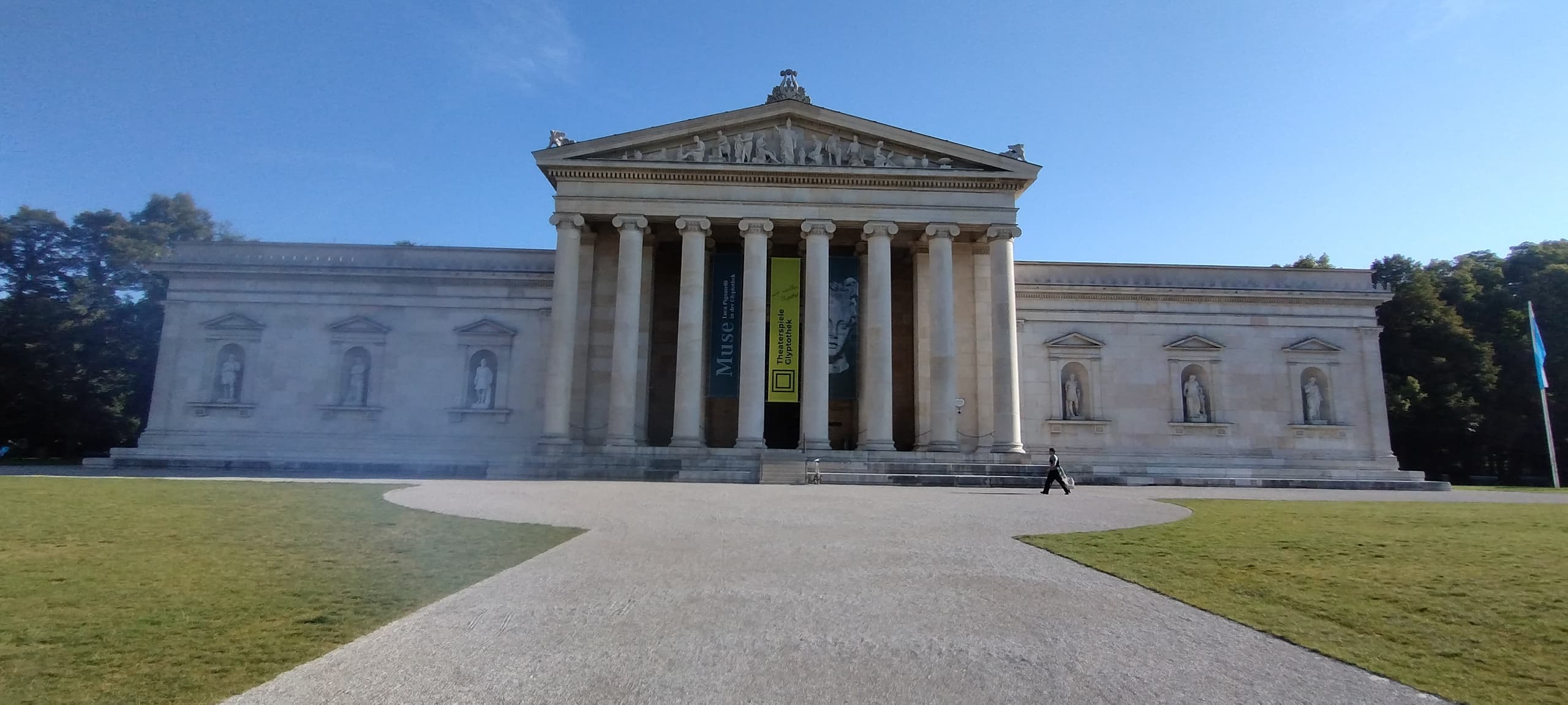 Selfie in front of historic museum steps, urban sightseeing photo