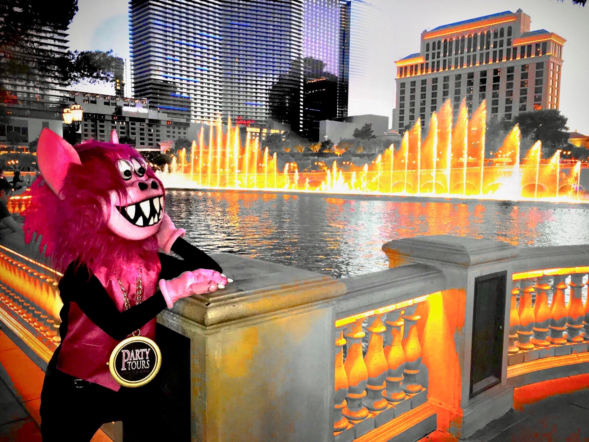 Bellagio fountain show with party mascot on Las Vegas Strip