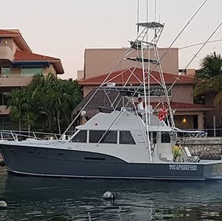 Luxury Offshore Fishing Aboard a 53' Hatteras from Puerto Aventuras photo 1