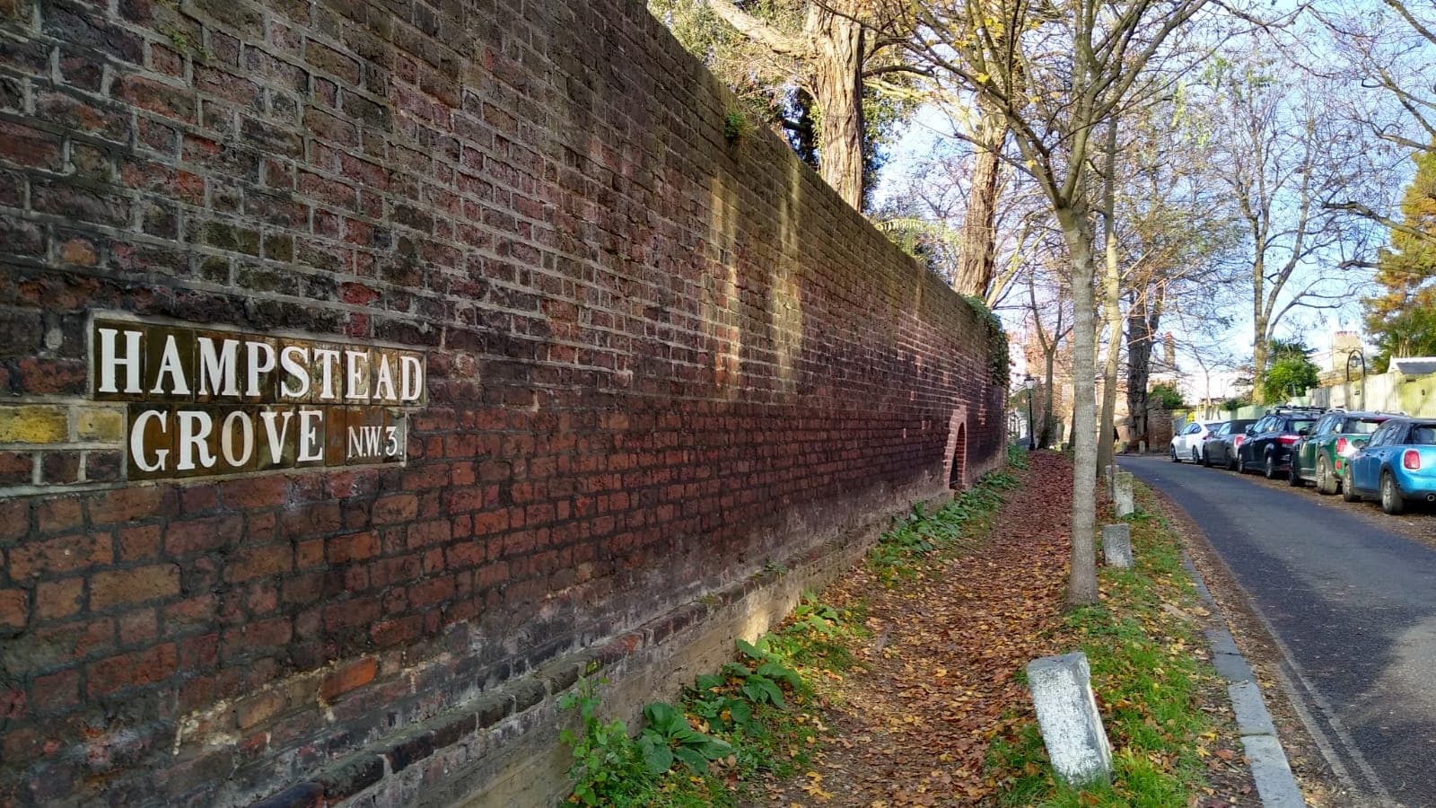 Hampstead Grove brick sign and leafy path, London park walk