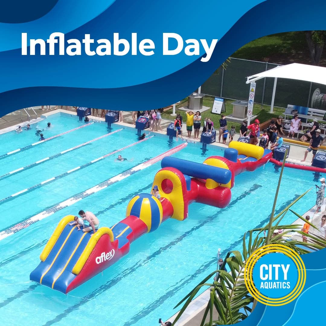 Kids on inflatable obstacle course at outdoor community swimming pool