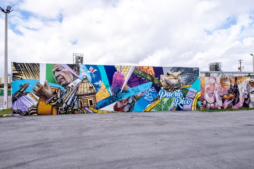 Wide panoramic mural wall with open lot, Wynwood outdoor art