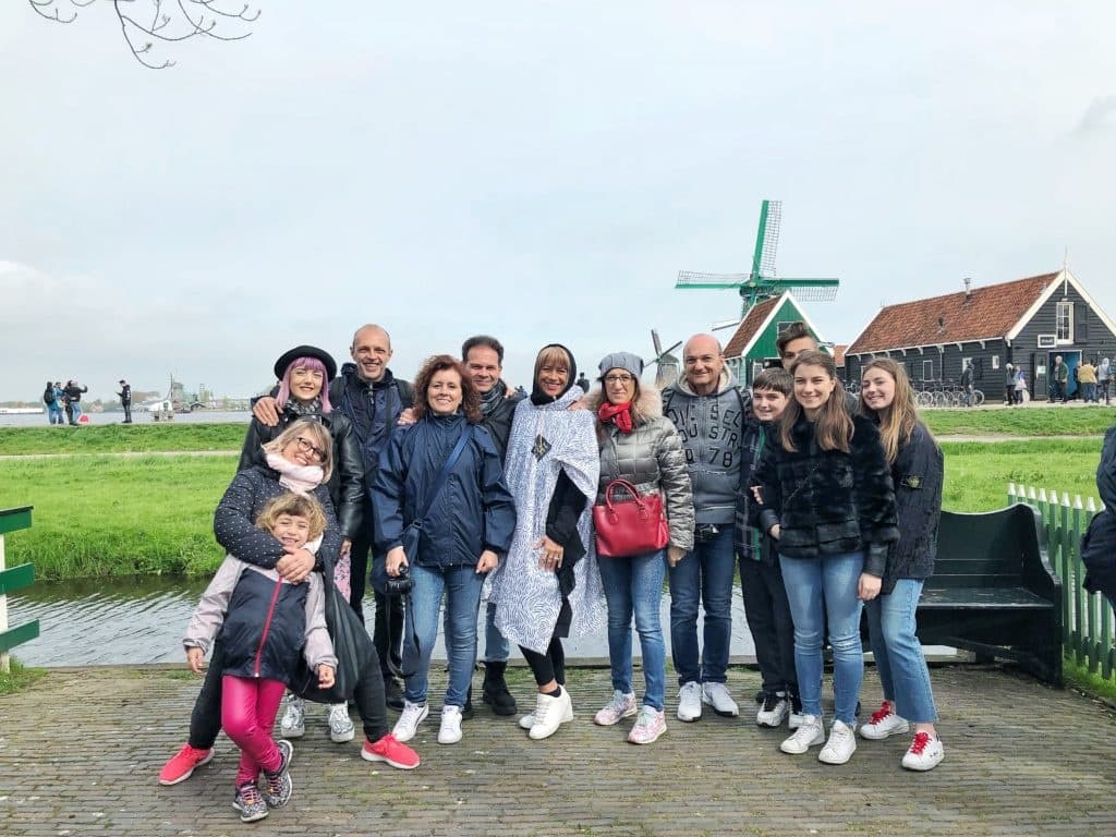 Large group at Dutch windmill in Zaanse Schans on day tour