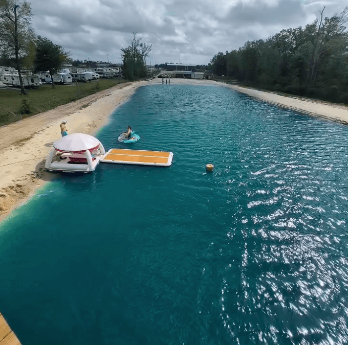 Aerial lagoon view with floating platform and turquoise water