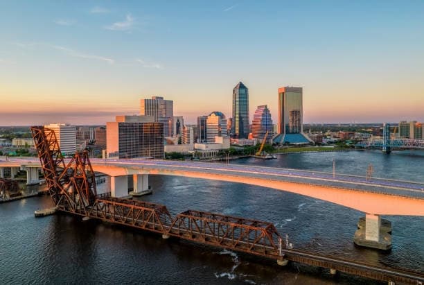 Aerial skyline of Jacksonville and St. Johns River at sunset