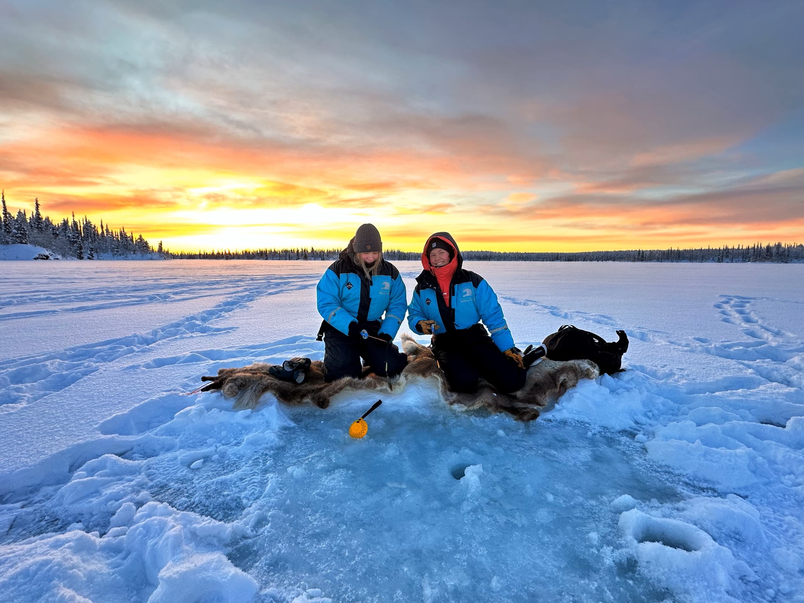 Winter Ice Fishing & Snowmobiling at Wilderness Hotel Kieppi