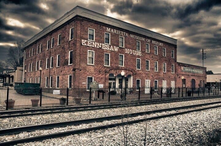 Historic brick depot by train tracks in Marietta, Georgia