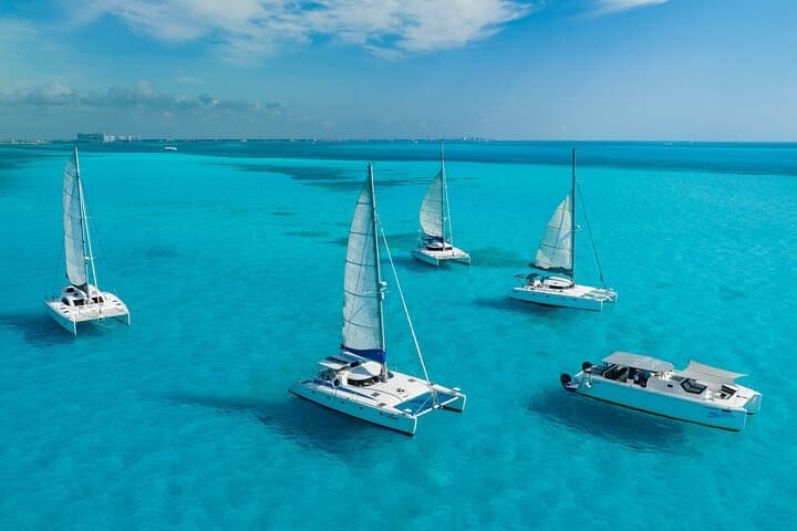 Catamarans sailing on turquoise Caribbean sea, aerial panorama