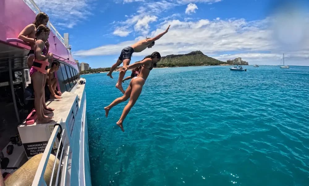 Waikiki Sunset Swim: Golden Hour Catamaran Cruise with Diamond Head Views photo 1
