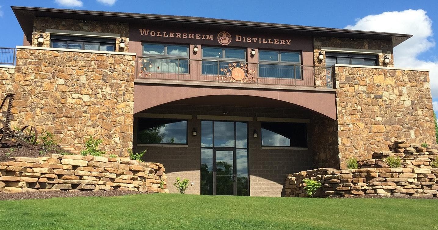 Front entrance of Wollersheim distillery building with stone facade