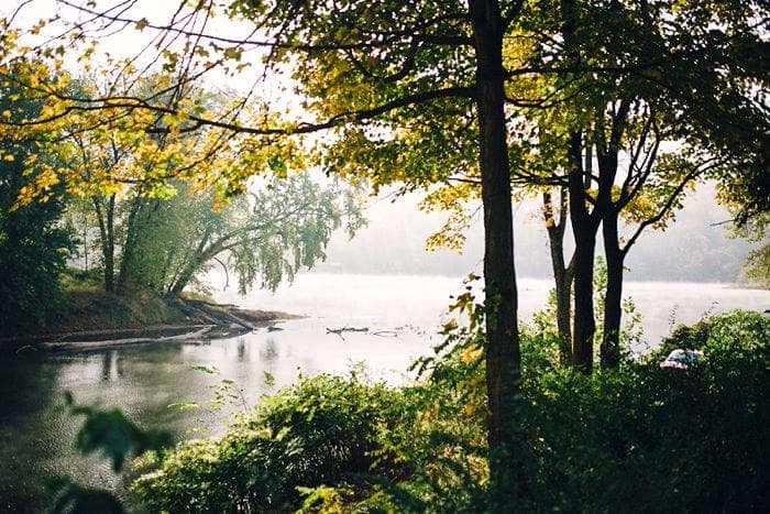 Scenic river bend framed by trees at Shawnee Inn waterfront view