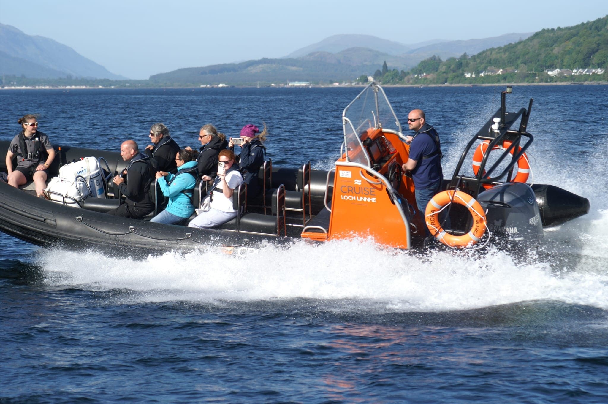 RIB speedboat tour on open loch waters with passengers