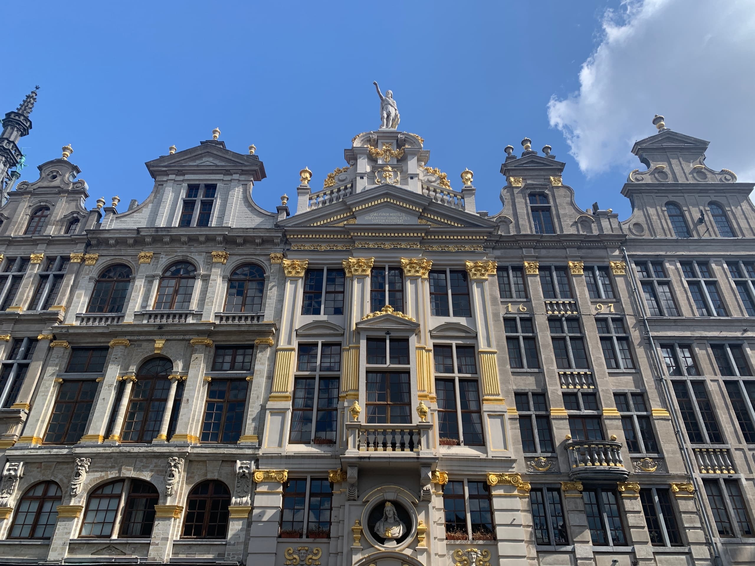 Grand Place ornate guildhall facades, historic Brussels square view