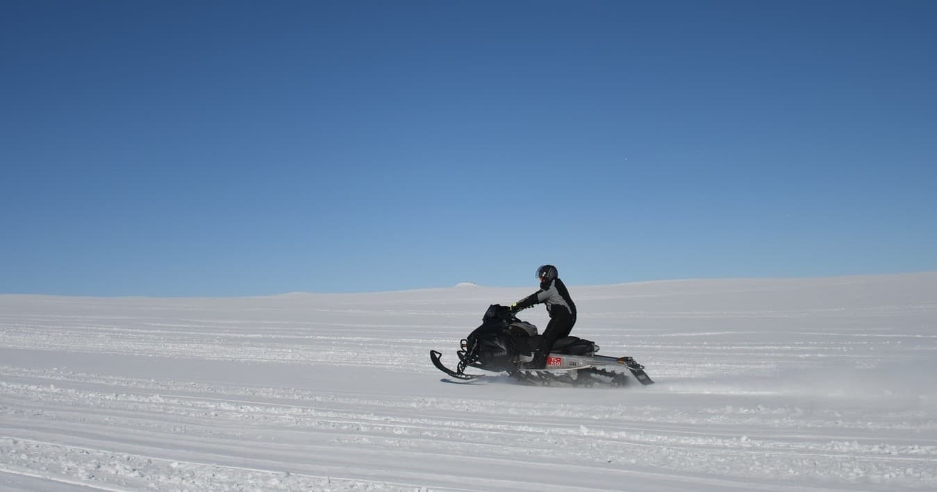 Explore Kiruna’s Winter Wilderness: Northern Lights Snowmobile Adventure