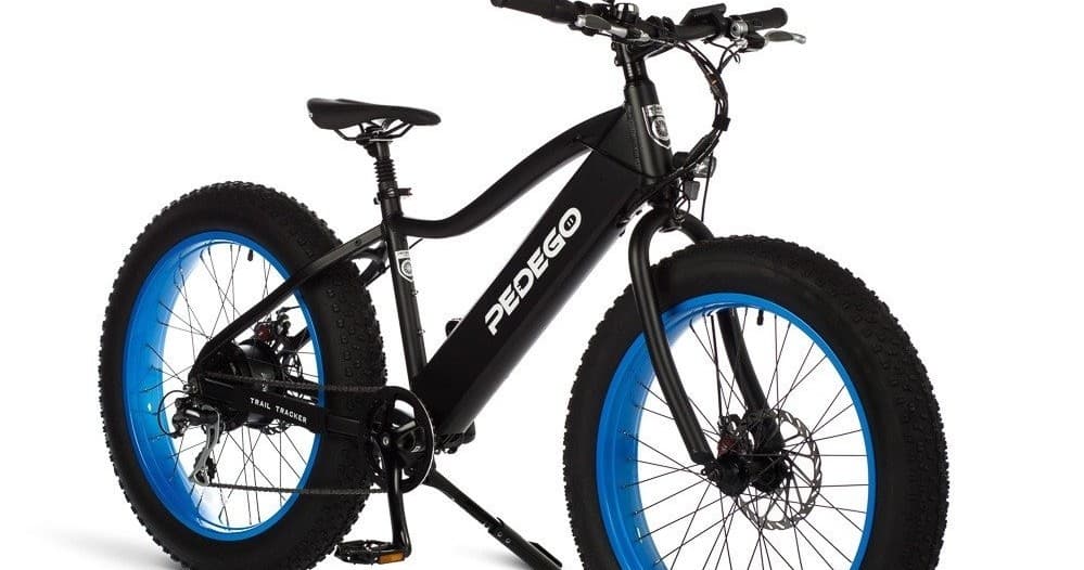 Black fat-tire electric bike studio shot, rugged trail style
