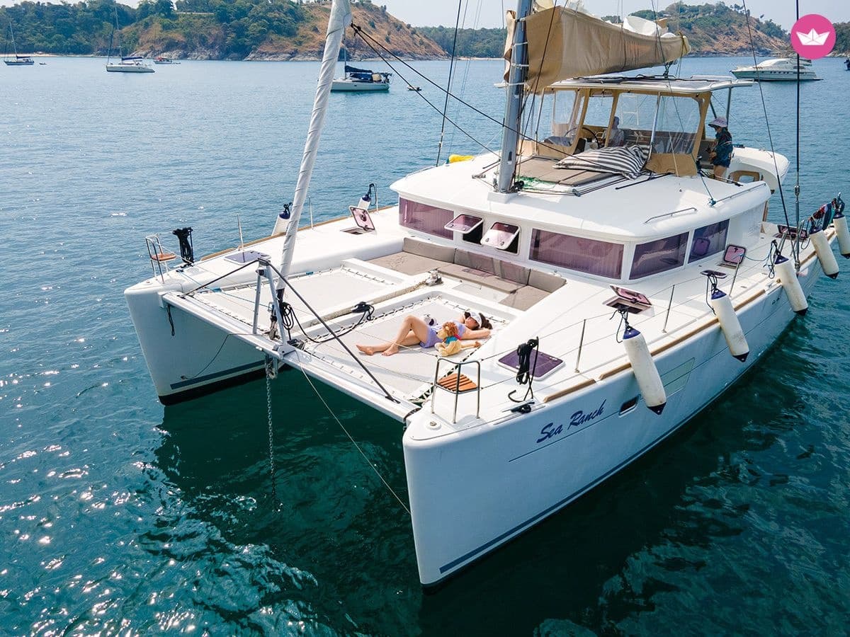 Front view catamaran moored in clear coastal waters
