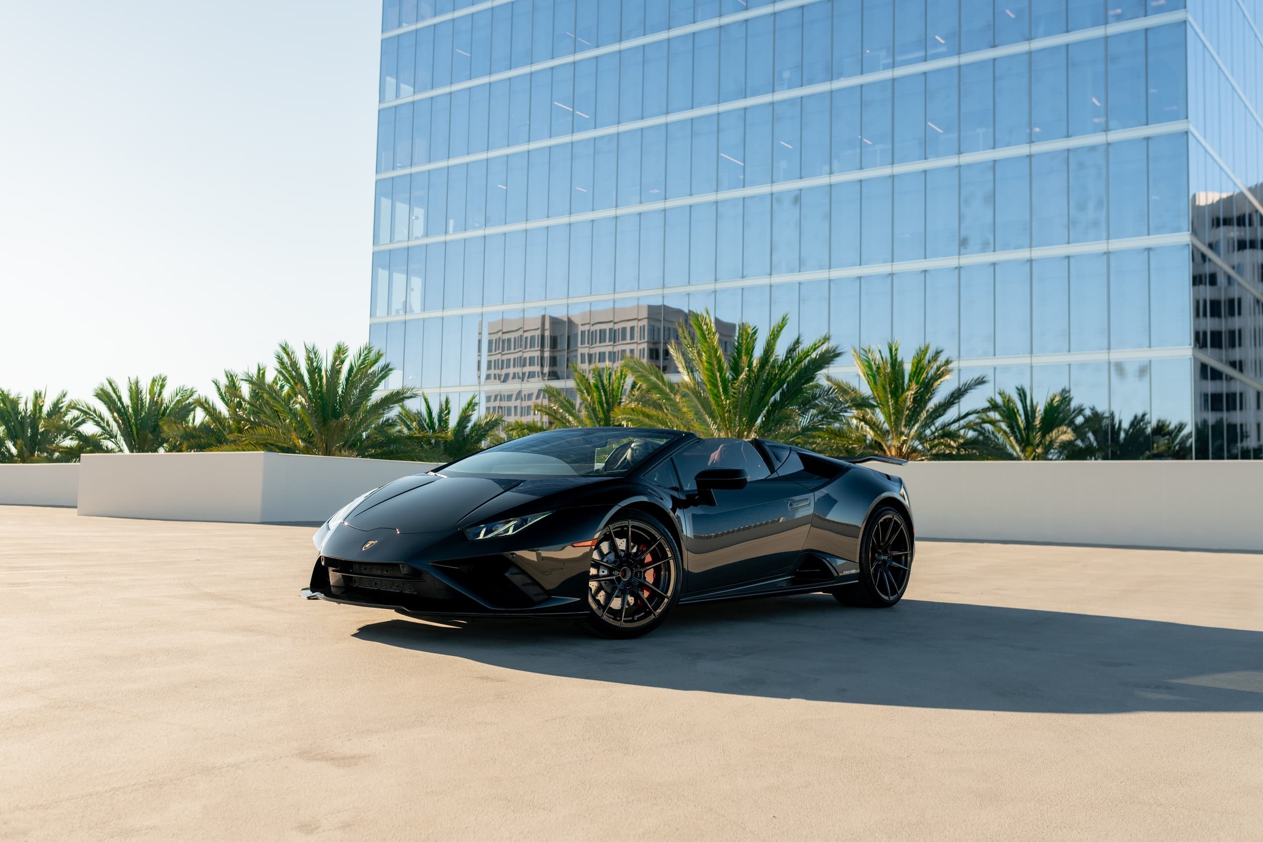 Drive the Black Lamborghini Huracan Evo Spyder in Huntington Beach