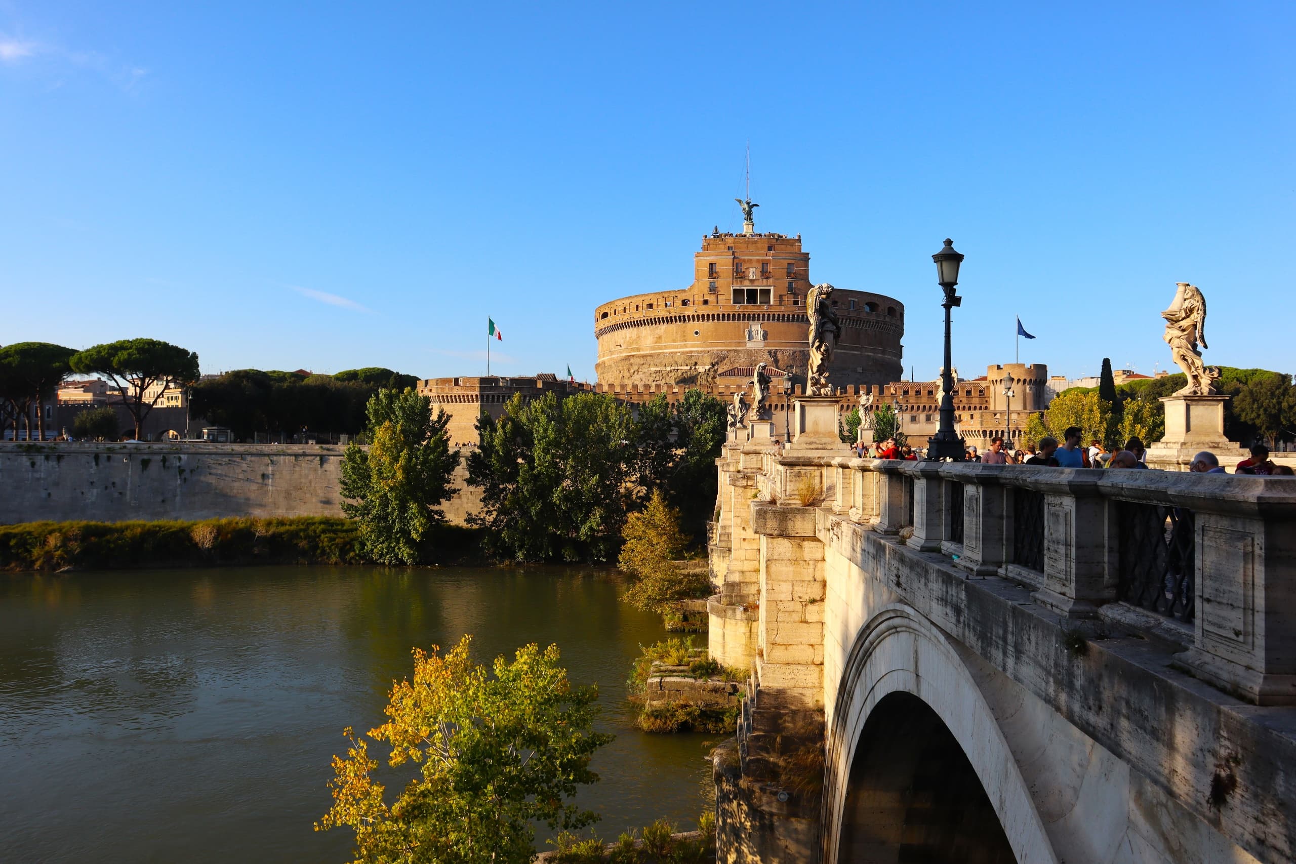 Riders overlooking Tiber River and Castel Sant'Angelo in Rome