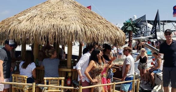 Experience the Magic of Newport Harbor Christmas Lights Cruises on a Floating Tiki Bar