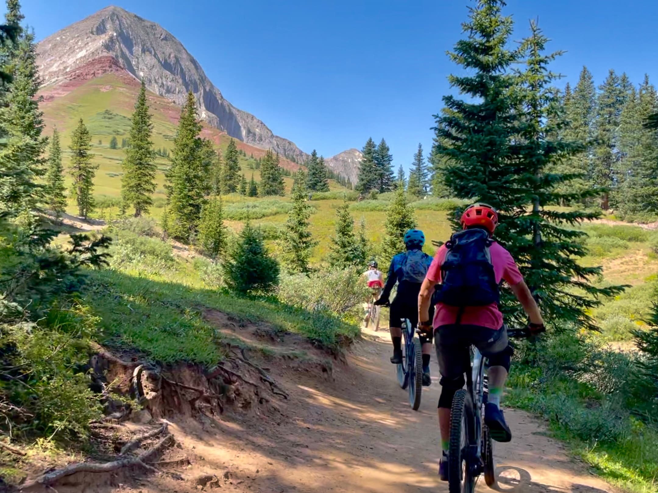Guided mountain bike ride on high alpine singletrack trail