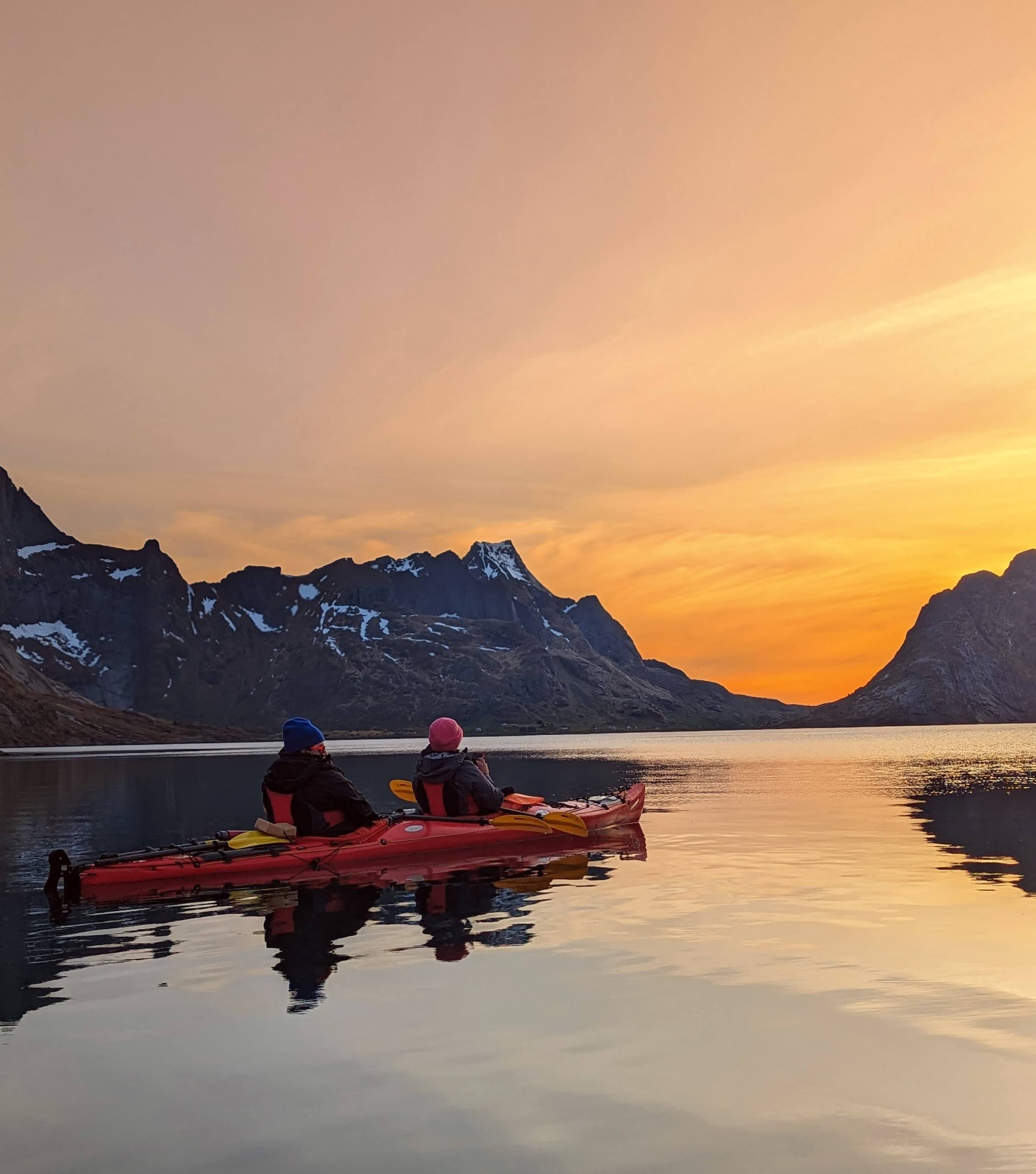 Kayak at Dusk in Reine Fjord with Saga Adventures Lofoten