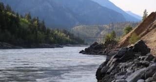 Scenic Fraser River canyon with rocky banks and mountain views