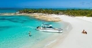 Axopar 37' Private Charter: Full-Day Snorkel & Sandbar Adventure in Grace Bay photo 1