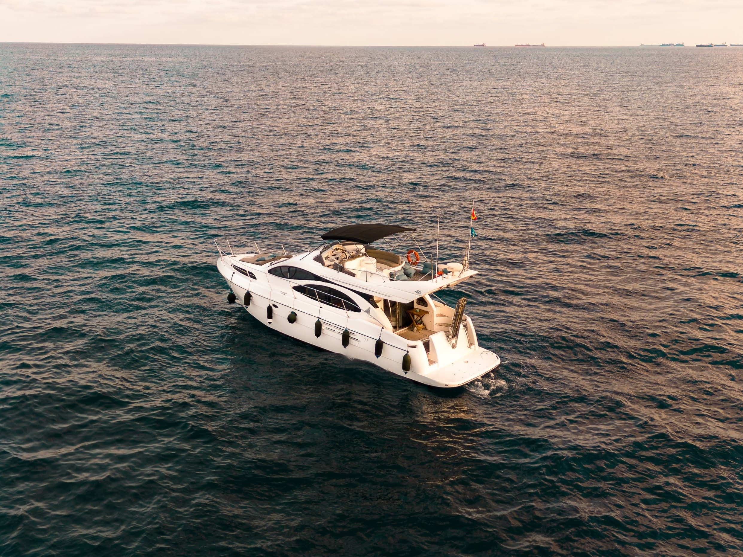 Sunset on the Azimut 46: Private Luxury Motor Yacht Cruise Off Barcelona photo 3