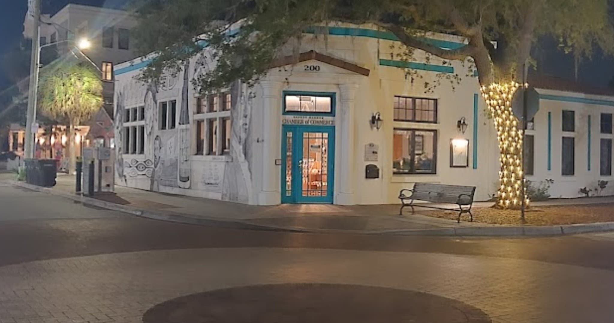 Historic downtown corner lit at night for evening walking tour