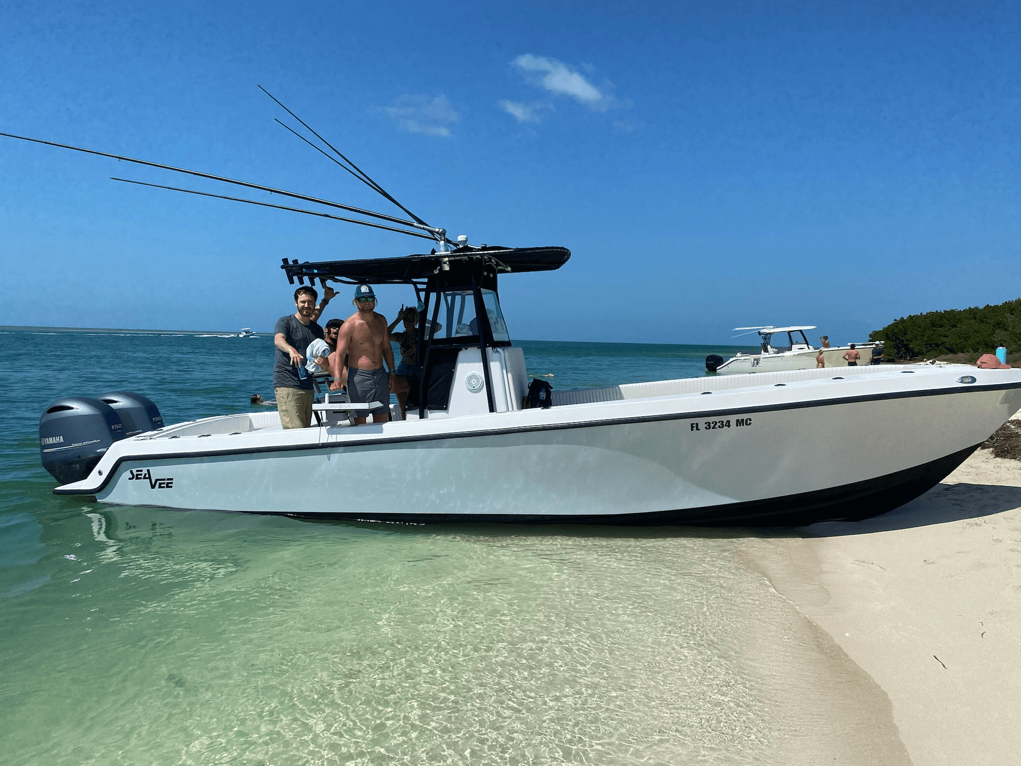 Beachside center-console boat in Florida Keys with anglers