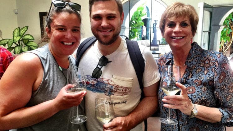Friends wine tasting at Santa Barbara food tour enjoying pours