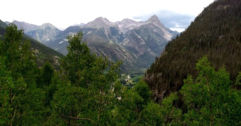 Scenic mountain valley vista for backcountry horseback riding