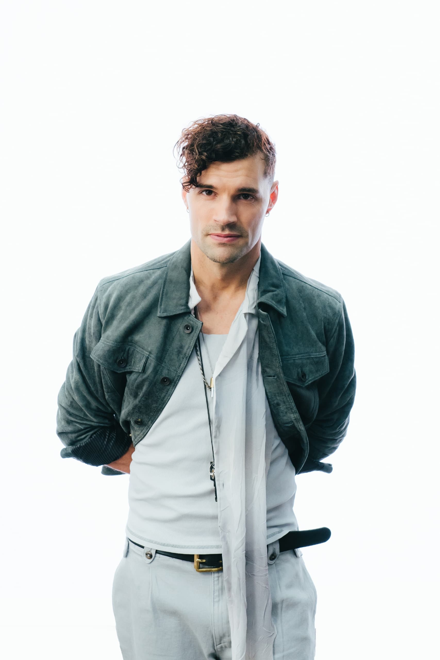 Portrait of songwriter posing in studio headshot for promotion