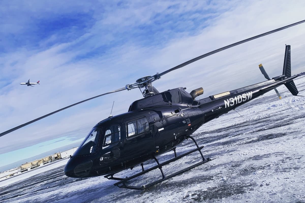 City skyline aerial at golden hour, urban helicopter sightseeing