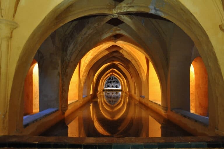 Arched reflecting baths interior showing Moorish arches in Seville